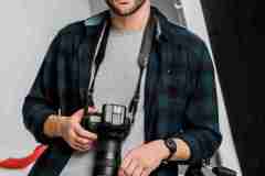 handsome-professional-young-photographer-looking-a-2024-11-17-22-33-02-utcResized_11_11zon